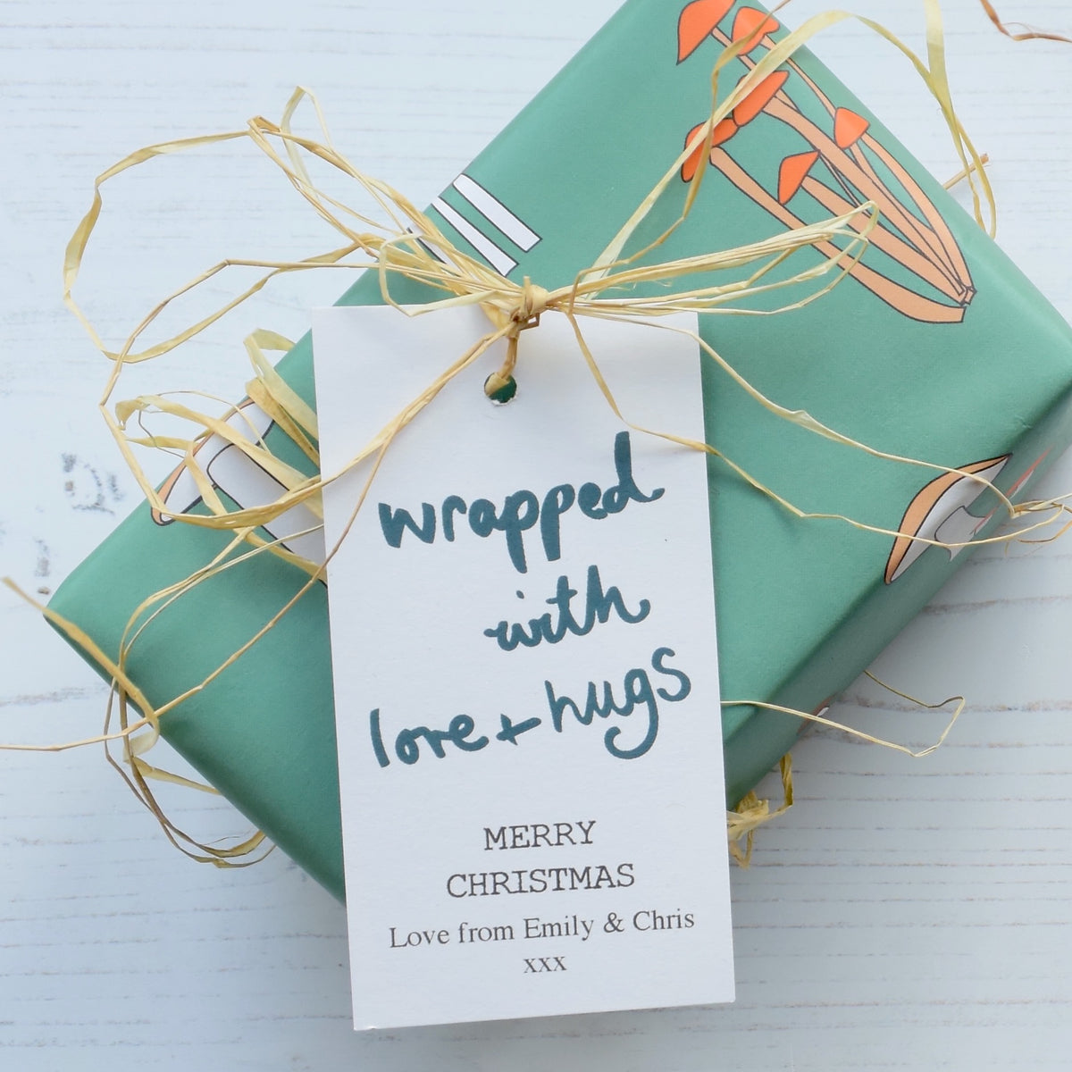 10 Personalised 'Wrapped With Love And Hugs' Christmas Gift Tags